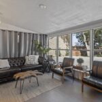 Leather couch and chairs in the Sunroom